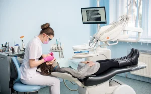 dentist checking tooth